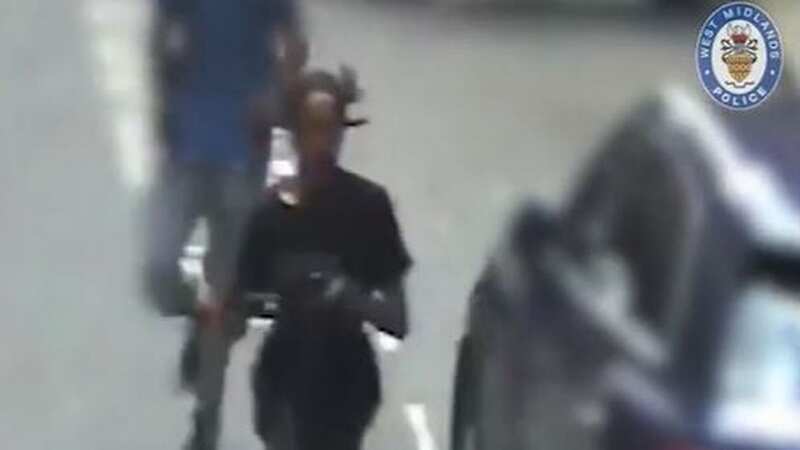 Moment smirking gunman chased through busy city centre before cops stop him