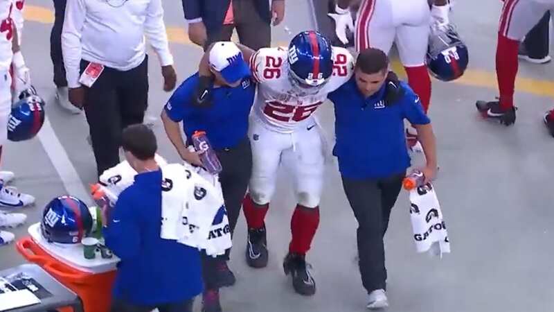 Saquon Barkley limped off the field ion the fourth quarter on Sunday (Image: FOX NFL)