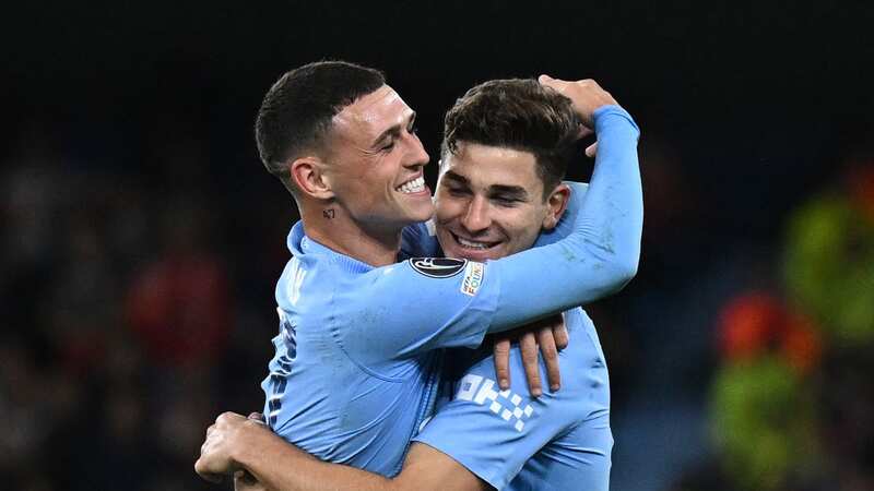 Julian Alvarez celebrates with Phil Foden after scoring for Manchester City (Image: AFP via Getty Images)