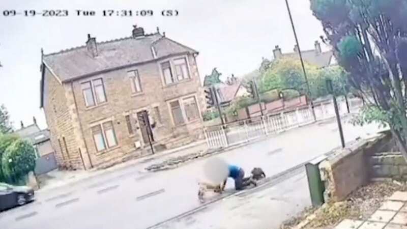 Horror moment man dragged into road as 