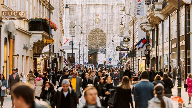 Crowds of tourists shopping on a street in Vienna, Austria (Image: Getty Images)