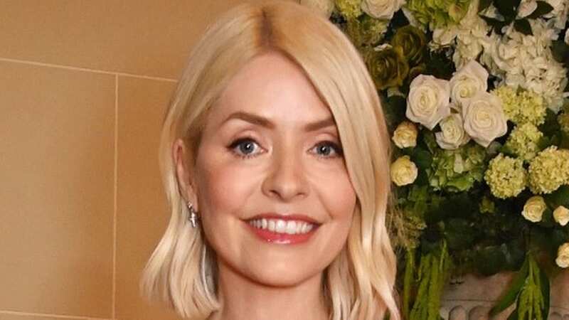 Holly Willoughby dances in glittering minidress as she celebrates huge milestone