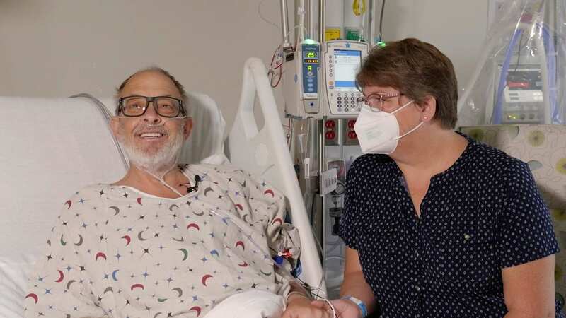 Lawrence Faucette in hospital with his wife before receiving the pig heart transplant (Image: AP)