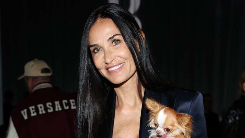Demi Moore sat in the front row of the Milan Fashion Week Versace show on Friday (Image: WireImage)