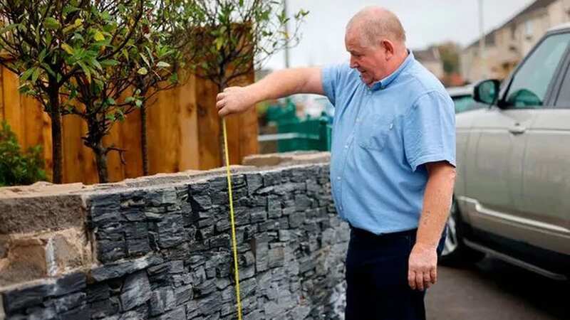 Mark Roberts was ordered to demolish half his garden wall (Image: Daily Post Wales)