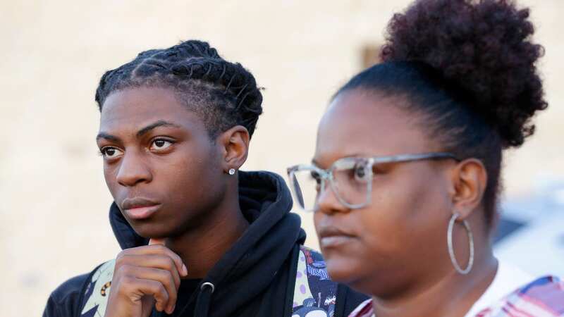 Darryl George, a 17-year-old junior, and his mother Darresha George speak with reporters (Image: AP)