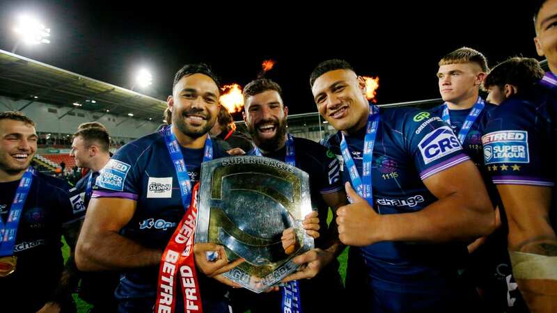 Wigan Warriors celebrate winning the League Leaders