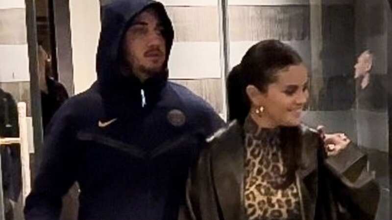 Selena was seen holding hands with the mystery man (Image: BACKGRID)