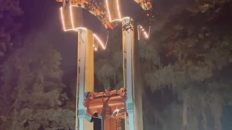 Riders trapped helplessly upside down on the theme park ride (Image: @jiashira_/TikTok)