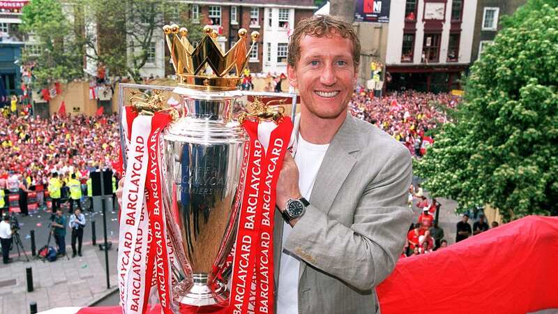 Ray Parlour celebrates the 2003/04 Premier League title win (Image: Arsenal FC via Getty Images)