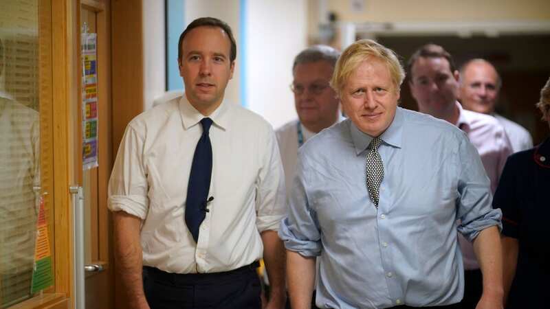 Matt Hancock and Boris Johnson (Image: Getty Images)