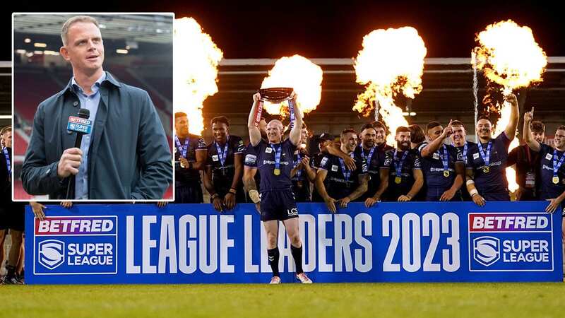 Wigan Warriors captain Liam Farrell lifts the League Leaders