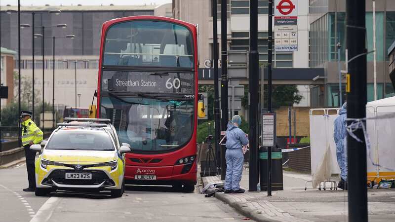 Forensic investigators at the scene near the Whitgift shopping centre (Image: PA)