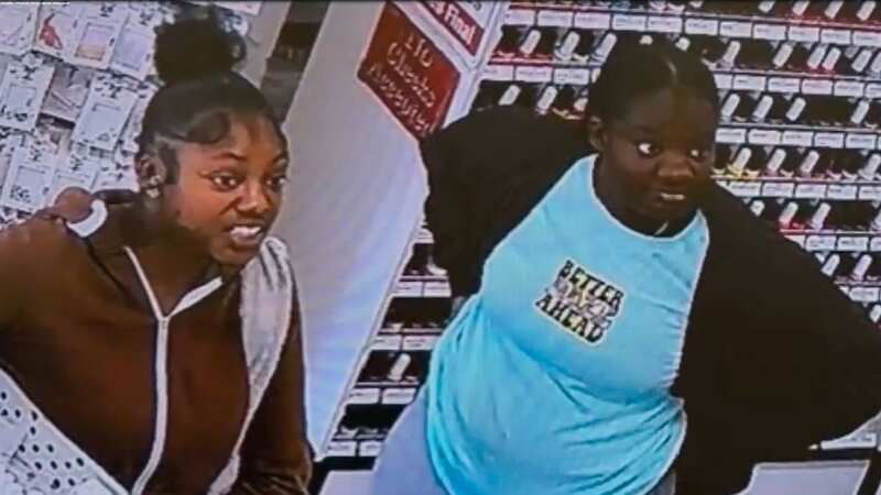 A woman will go down as one of the dumbest criminals after she returned to the store she robbed to demand her cell phone that she dropped (Image: FOX)