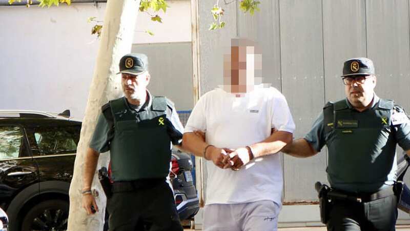 The man being escorted tfrom Palma