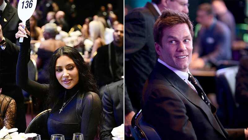 Kim and Tom were seen flirting as they bid