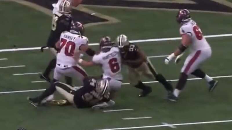 Two Saints defenders hit Mayfield from opposite angles as the quarterback landed awkwardly