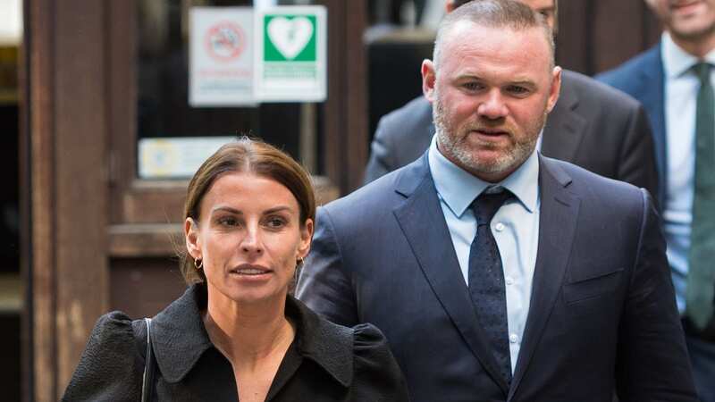 Coleen said she clocked her husband Wayne Rooney giggling during the trial (Image: Anadolu Agency via Getty Images)