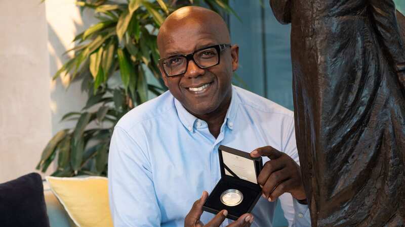 Trevor Sterling, chair of Mary Seacole Trust holds the new collective coin (Image: PA)