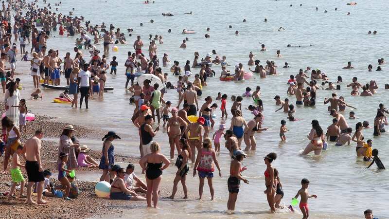 Brits could be blocking to the beach in October (Image: PA)