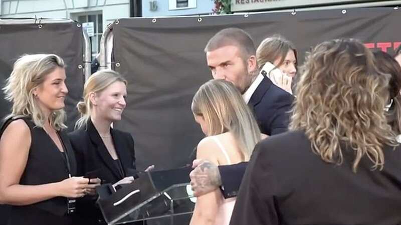 David Beckham ignores backlash and gives daughter Harper loving kiss at premiere