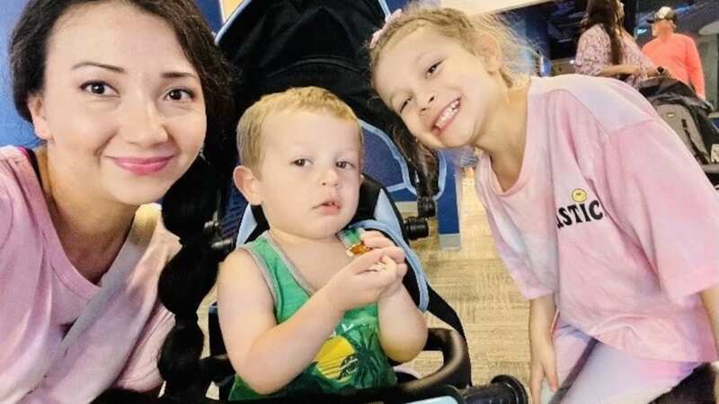 Nancy Johnson poses with her two-year-old son Jacob and five-year-old daughter Mia (Image: Newsflash)