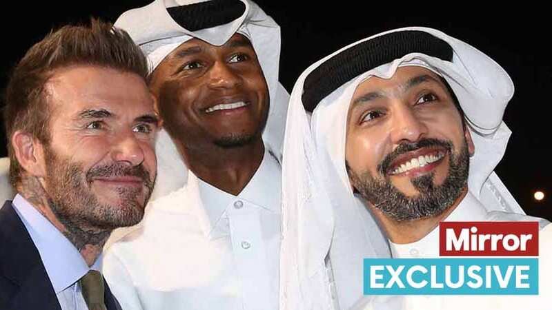 David Beckham posing for a photo ahead of the Qatar World Cup (Image: FIFA via Getty Images)