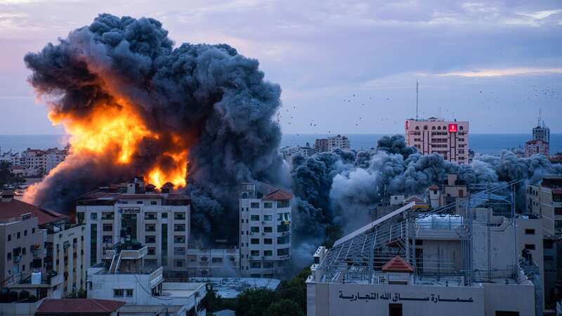 Fire and smoke rises following an Israeli airstrike in Gaza (Image: AP)