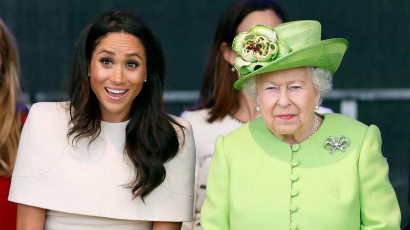 Meghan Markle and the late Queen Elizabeth II carried out a small handful of joint engagements before the Duchess of Sussex quit her royal role (Image: Getty Images)