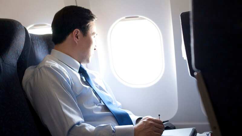 He had to spend the whole flight cramped due to the woman in front reclining her seat for the whole flight (Image: Getty Images/blue jean images RF)