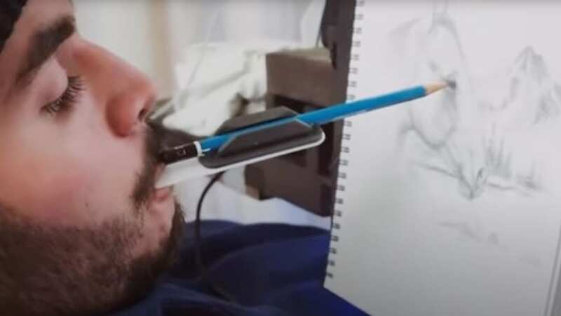 12 years ago, Salas was left paralysed by a bacterial infection - then, he picked up a pencil and began creating art (Image: Devon Rodriguez/Youtube)