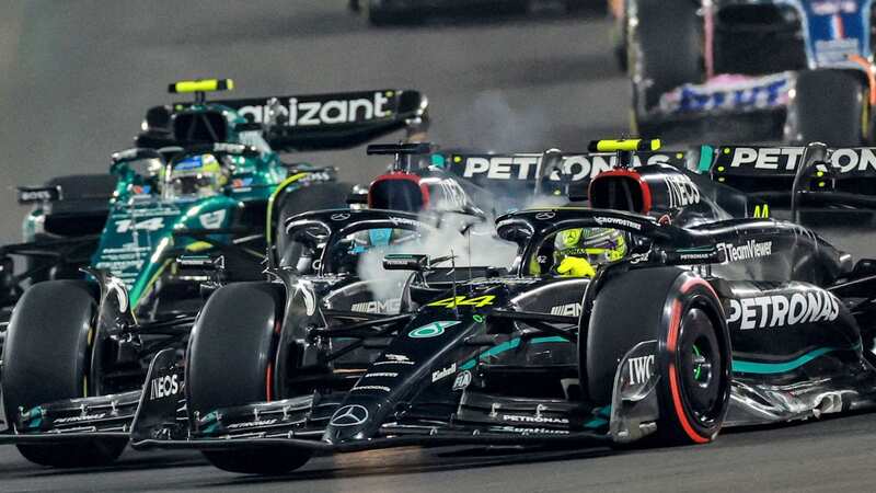 Lewis Hamilton and George Russell collided on the first lap of the Qatar GP (Image: AFP via Getty Images)