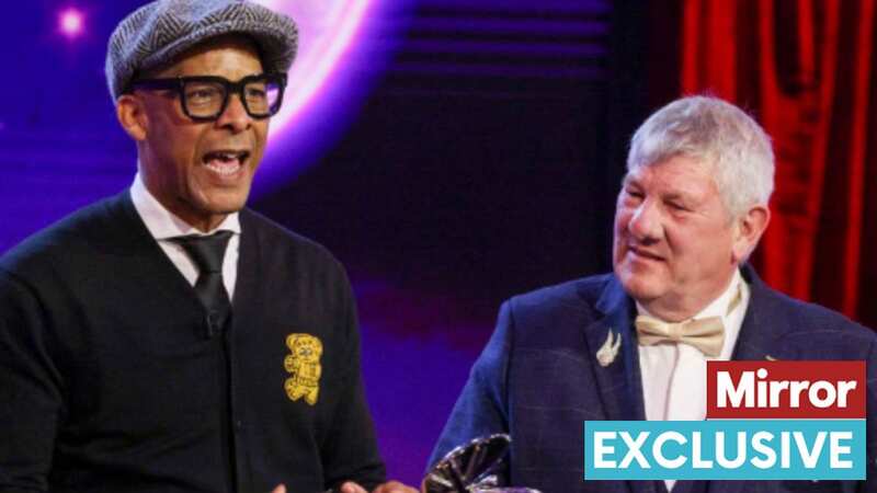 Lorry driver beams beside TV hero Jay Blades as he accepts POB Award for bravery