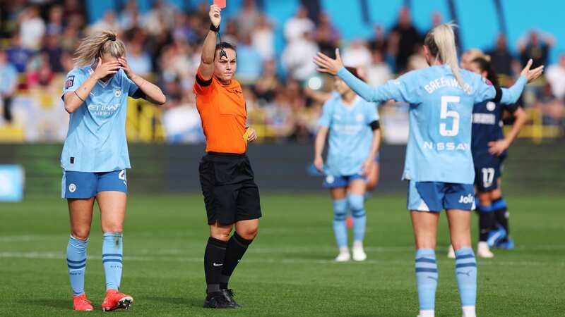 Referee, Emily Heaslip shows a red card to Alex Greenwood of Manchester City (Image: Alex Livesey/Getty Images)