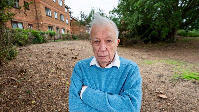 Keith Ramsell outside his home amongst the cleared scrubland in Bushey, Hertfordshire (Image: James Linsell-Clark / SWNS)