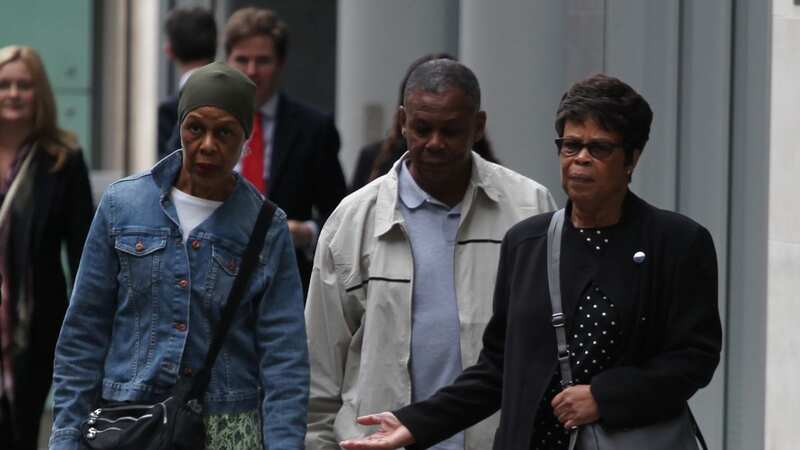 Jo-Ann Morris, Leonard Grizzle and Hope Dillon outside the High Court after a hearing over their dad Kenneth Grizzle