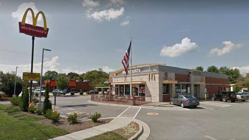 Police have arrested a woman they claim is a McDonald