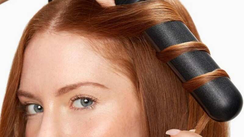 The Cloud Nine Waving Wand produces soft glamorous waves and curls (Image: Amazon)