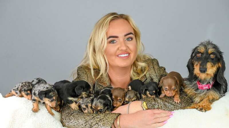 Rayma is shocked Winnie gave birth to 11 puppies (Image: Emma Trimble / SWNS)