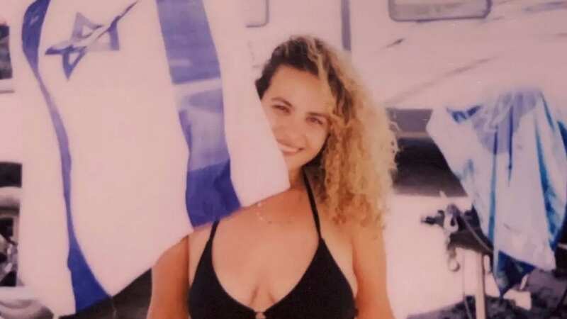 Israel raver describes how she survived by burying herself under dead bodies