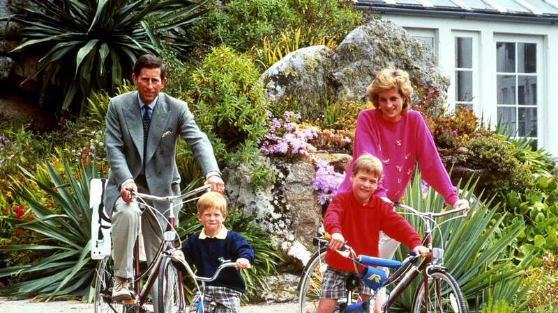 Prince William and Harry were snapped a few times during their childhood riding bikes (Image: PA Archive/PA Images)