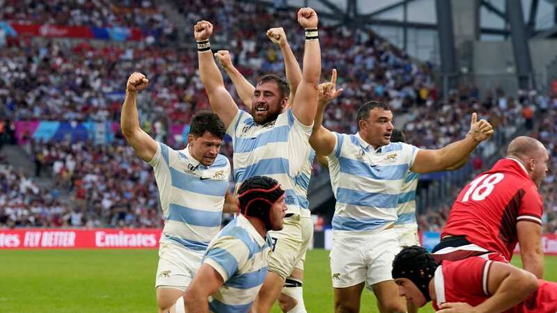 Argentina celebrate their late try which proved to be enough to beat Wales (Image: AP)