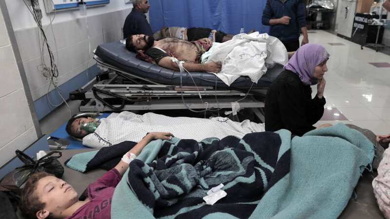 Wounded Palestinians wait for treatment at the overcrowded emergency ward of Al-Shifa hospital in Gaza City, on October 12 (Image: NurPhoto via Getty Images)