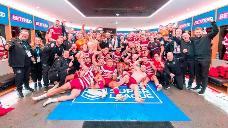 Wigan Warriors celebrate their Grand Final glory in the Old Trafford changing rooms (Image: Allan McKenzie/SWpix.com)
