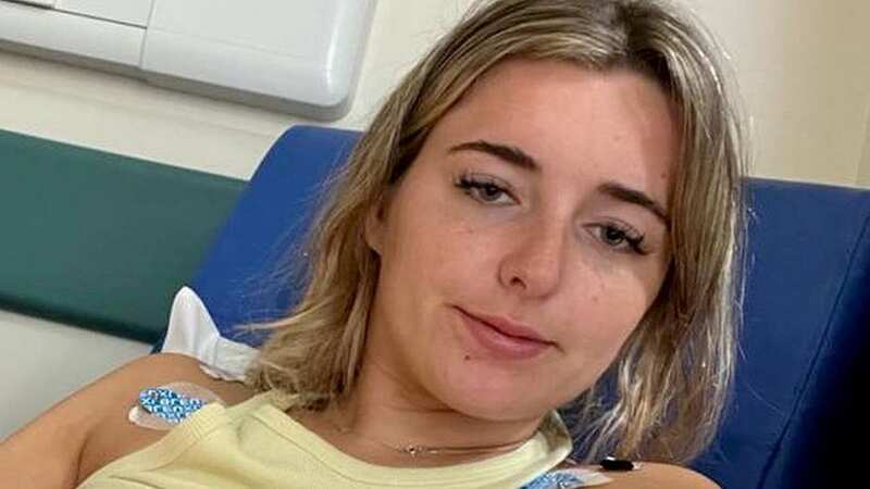 Maisie Lewis in hospital (Image: Maisie Lewis / SWNS)