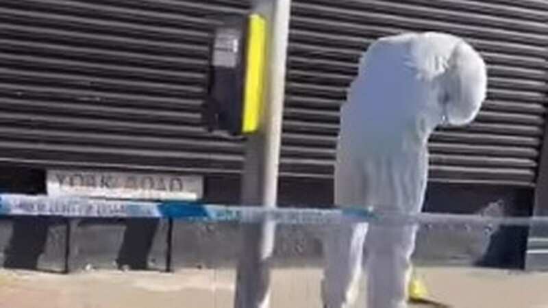 A forensic officer examines a large blade on the pavement in Hartlepool (Image: FACEBOOK)