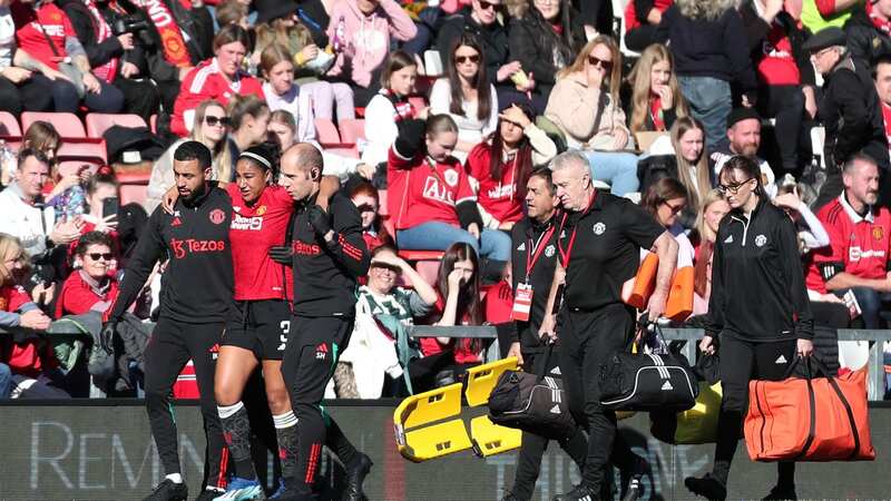 Gabby George of Manchester United receives medical treatment and is substituted off during the Barclays Women