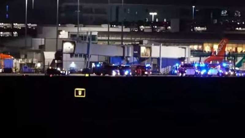 Police surround plane on runway as Manchester Airport closes over 