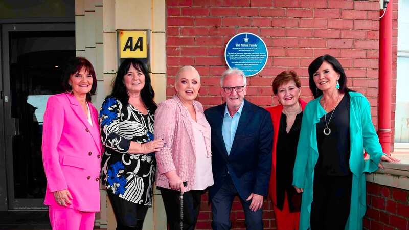 The Nolans with brother Brian at the plaque unveiling (Image: Aaron Parfitt / SplashNews.com)