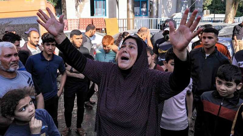 People gather at the site of the al-Ahli hospital on Wednesday (Image: AFP via Getty Images)